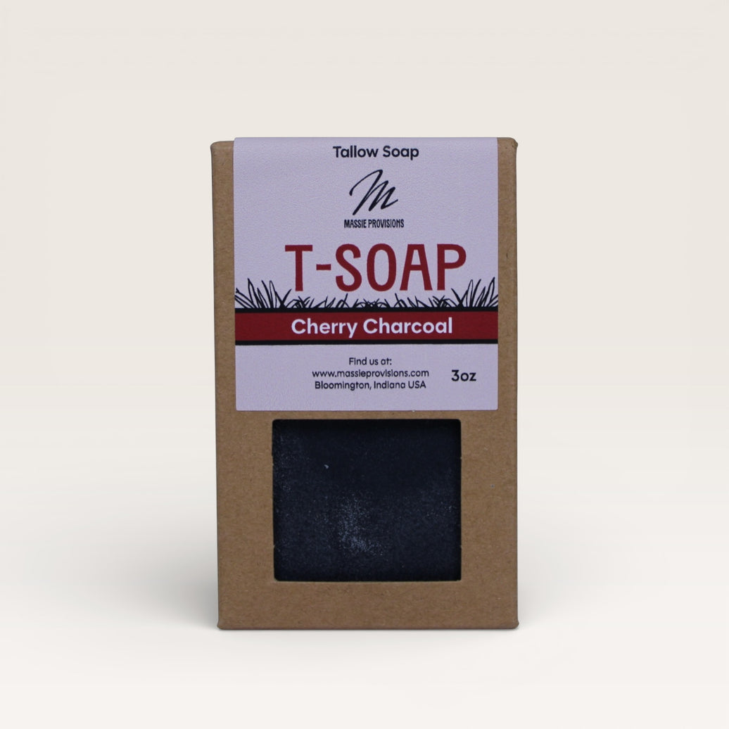 Massie Provisions T-Soap bar with a smooth texture and subtle color, resting on a wooden surface.