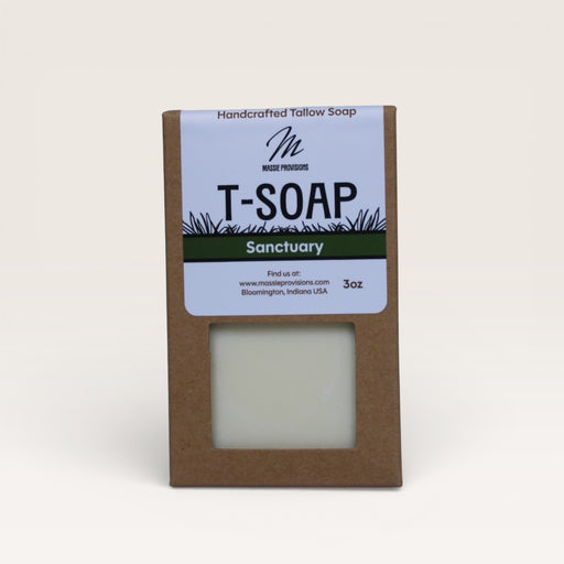 T-Soap by Massie Provisions, showcasing a bar of soap with a smooth texture and natural ingredients on a wooden surface.